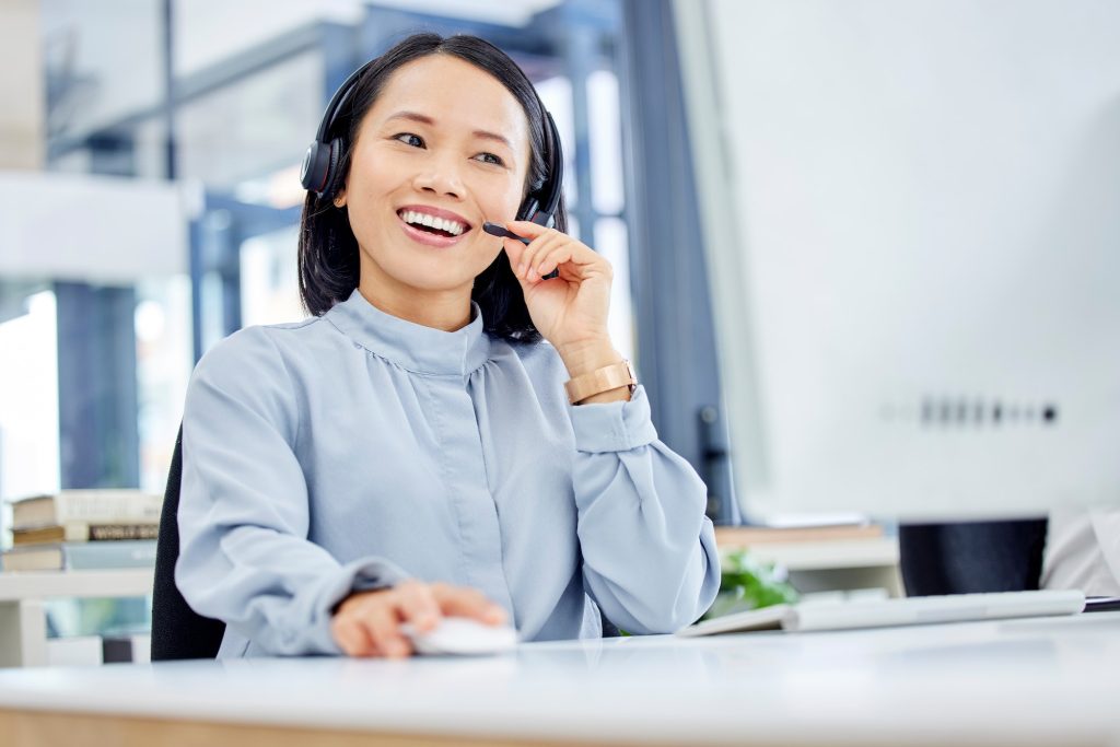 Call center, customer service and woman at computer while consulting online for CRM, contact us or